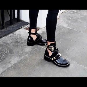 Balenciaga cut out boots.